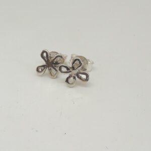 very small earrings.